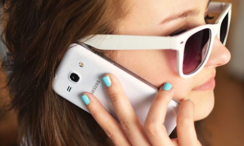 Person Sunglasses Woman Smartphone 500x300