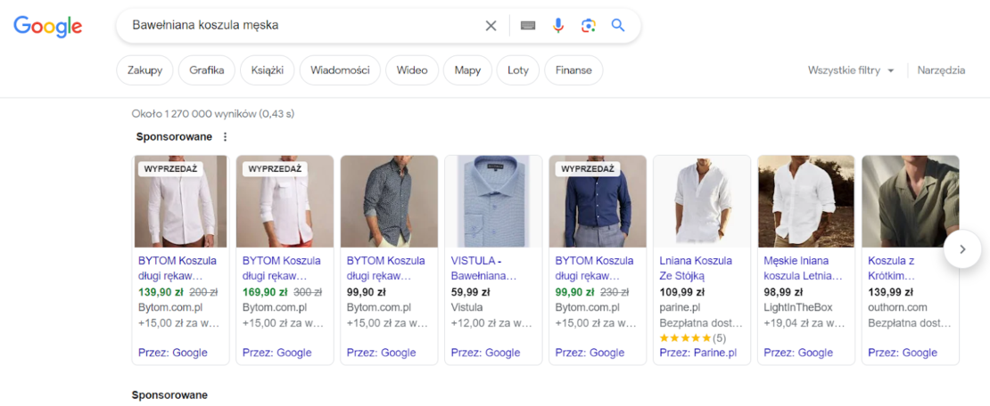 Kafelki z produktami i cenami w wynikach wyszukiwania.